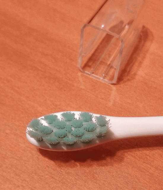 Дизайн чистящей головки зубной электрощетки Oclean Air Sonic
